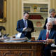 U.S. President Donald Trump (L-R), joined by Chief of Staff Reince Priebus, Vice President Mike Pence, senior advisor Steve Bannon, Communications Director Sean Spicer and National Security Advisor Michael Flynn, in the Oval Office.